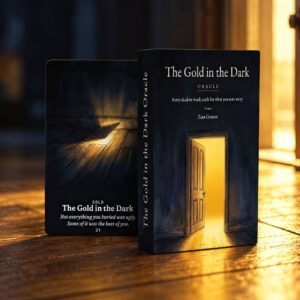 The Gold in the Dark shadow work oracle deck box with an open glowing door, beside The Gold in the Dark card